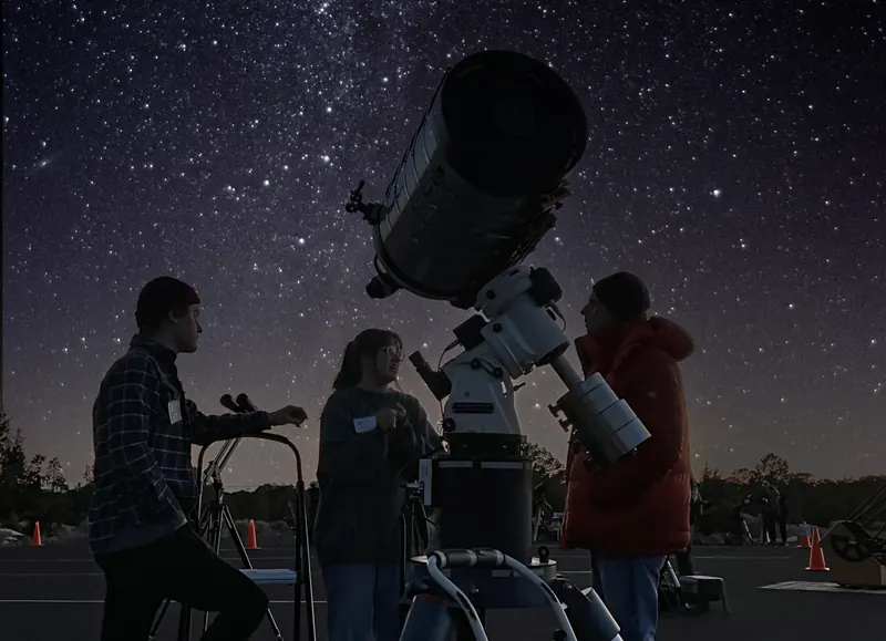 Amateur astronomers and their telescopes under the stars at the Grand Canyon Star Party